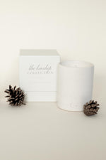 A scented candle inspired by winter scents