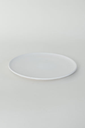 
                
                    Load image into Gallery viewer, A handthrown ceramic side plate in our Kinship Collection off-white glaze.
                
            